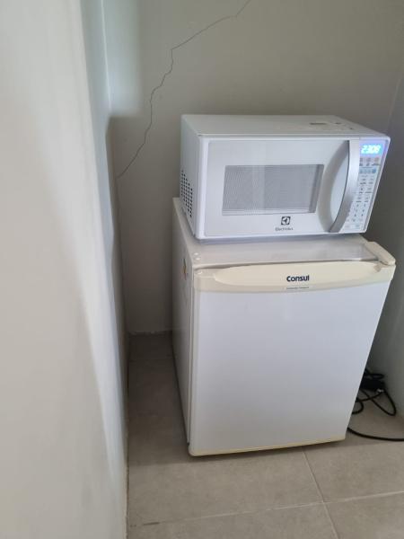 Imagem 2 da galeria do anúncio: Suíte com AR + Frigobar + Microondas