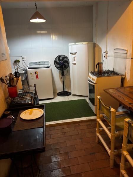 Imagem 10 da galeria do anúncio: suite com boas vibracoes com cozinha