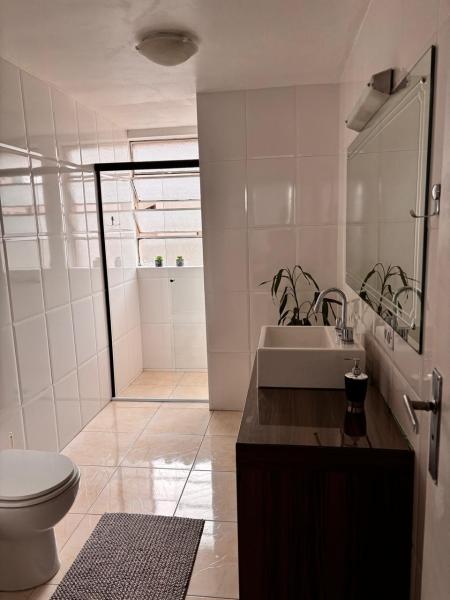 Imagem 12 da galeria do anúncio: Alugo quartos mobiliados no centro