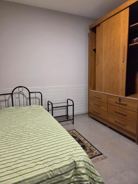 Imagem 12 da galeria do anúncio: Suite confortável em ambiente acolhedor