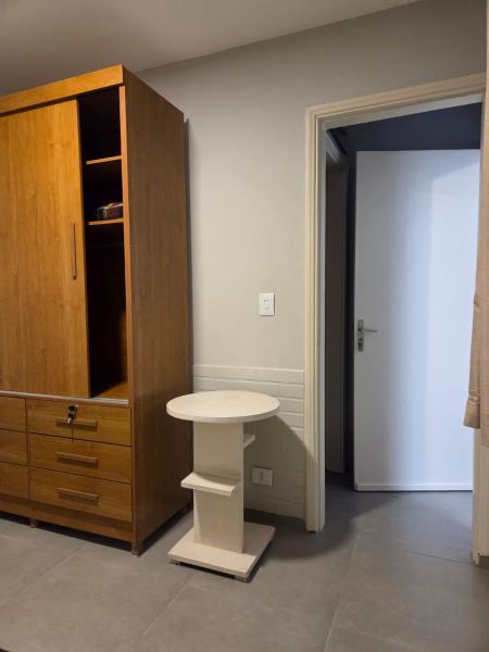 Imagem 13 da galeria do anúncio: Suite confortável em ambiente acolhedor