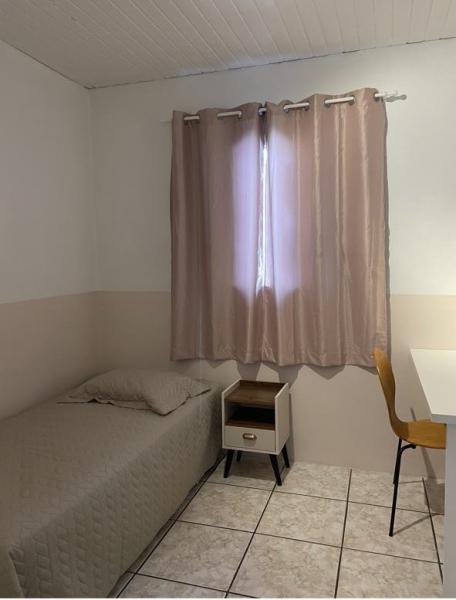 Imagem 9 da galeria do anúncio: Alugo quartos no Santa Monica