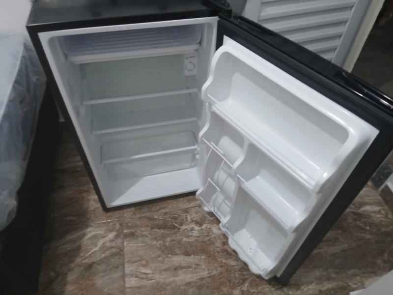 Imagem 7 da galeria do anúncio: Kitnet com cozinha e banheiro privativo.